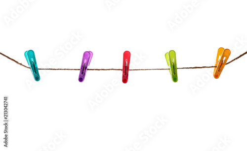 Colorful Clothes pins and the clothes line isolated on white background