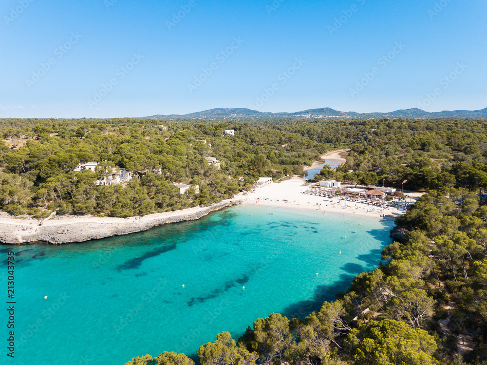 Aerial: The beach of Cala Mondrago in Mallorca, Spain