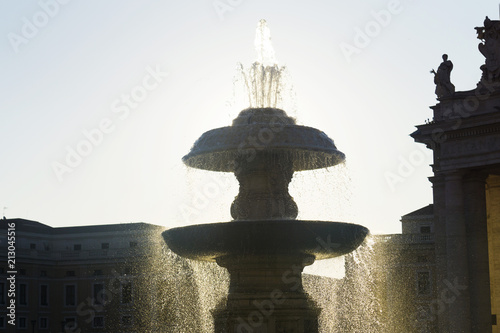 A fountain in St Peter's square Vatican city, Rome - Italy