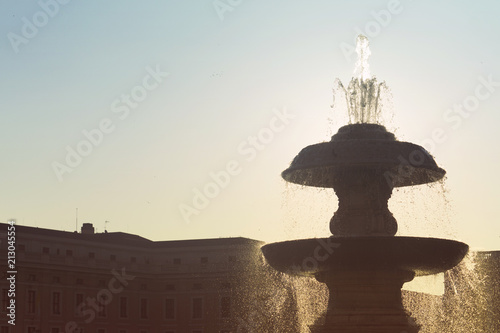 A fountain in St Peter's square Vatican city, Rome - Italy