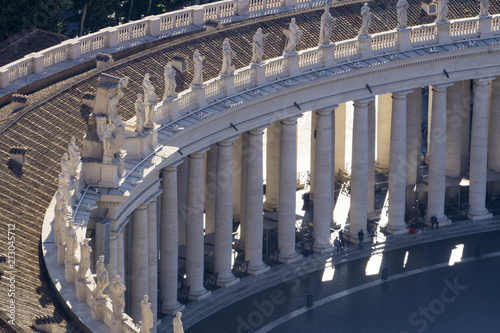 Statues ontop of the colonnades in St Peter's square, Vatican City, Rome, Italy