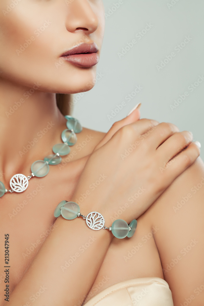 Silver Bracelet and Necklace with Semiprecious Stones on Female Body