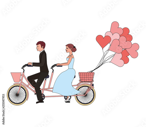 just married couple in bicycle and balloons helium with shape heart