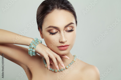 Cute Woman Face. Makeup, Necklace, Bracelet and Closed Eyes