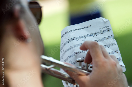 Trumpet player during marching band rehearsal on field, Stillwater, Oklahoma
