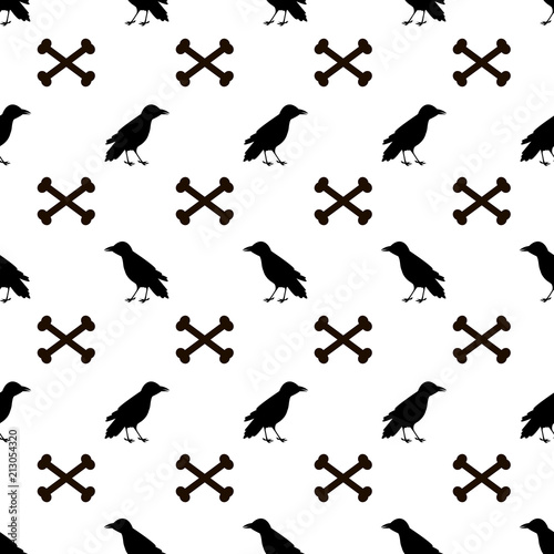 Seamless pattern with black ravens and bones on the white background © Fortuna23
