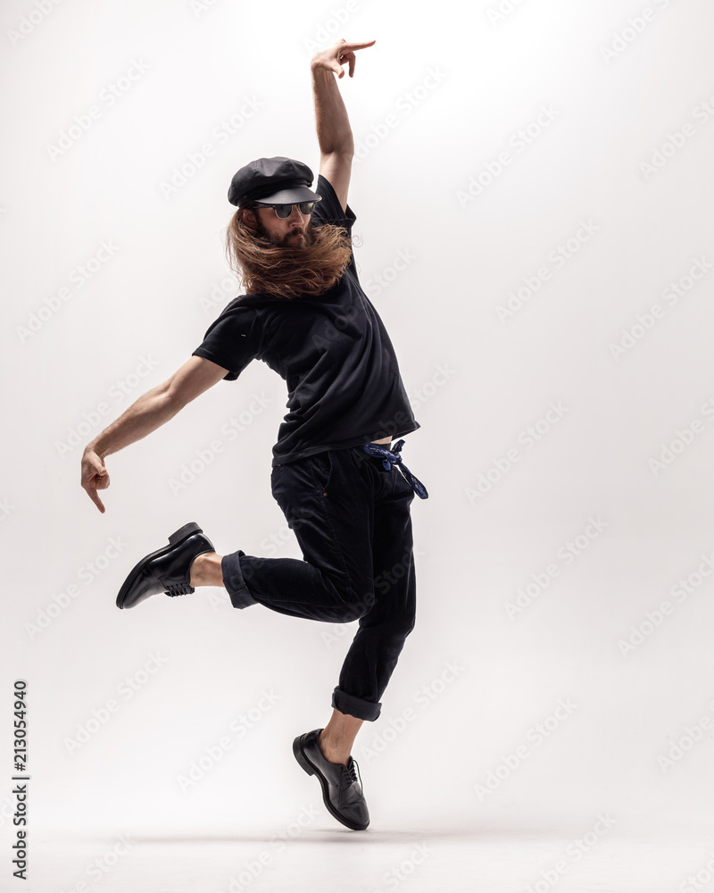 Fototapeta premium Young beautiful dancer posing in the studio