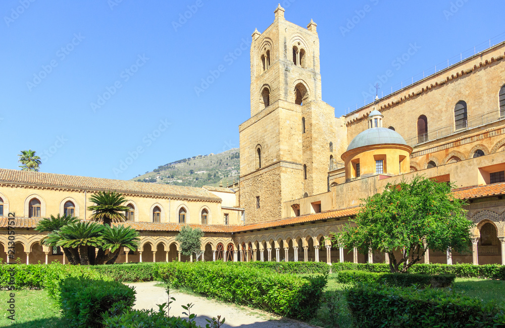 Garden of Benedictine Cloister at Monreale, Sicily. Each side has 26 ARabic - Norman arches resting on columns with splendid capitals.In total, there are 228 twin columns.