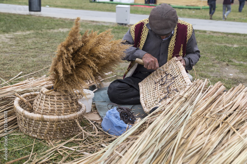 the man make local wicker basket.handcraft and handmade for local concept. 