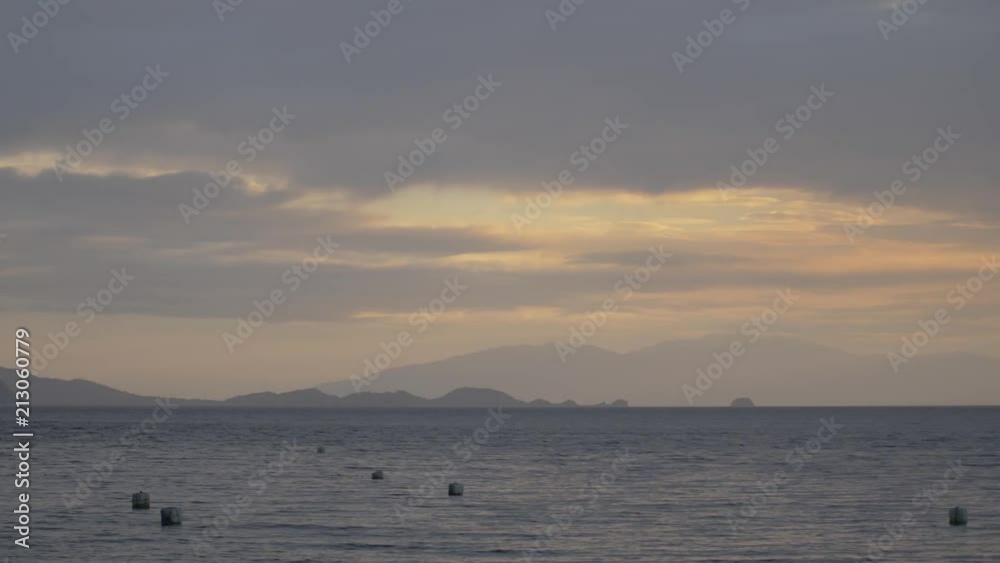 Panning shot of Mountains in the distance with dramatic sky at sunset Panning shot of Mountains in the distance with dramatic sky at sunset