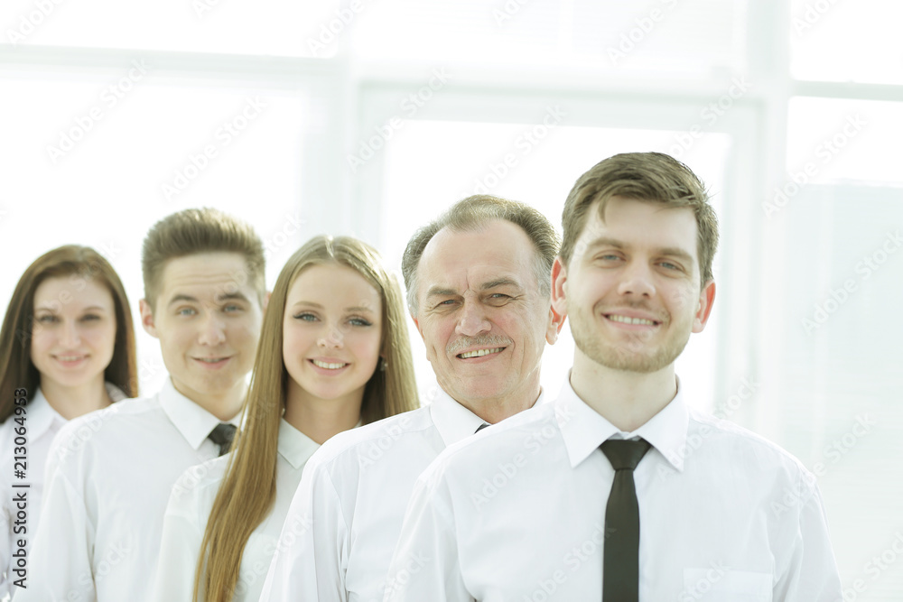 close up.boss and confident business team standing in a row close up.boss and confident business team standing in a row