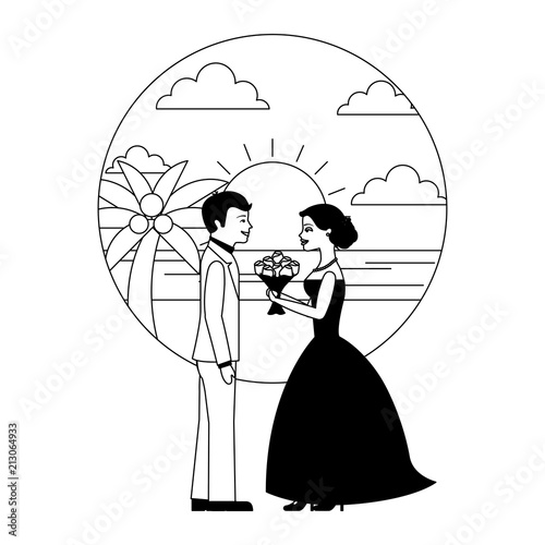 married couple in beach with bouquet of flowers photo