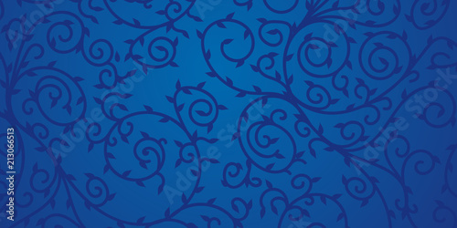 Blue floral ornament design for background. Dark swirls and leaves on blue surface.