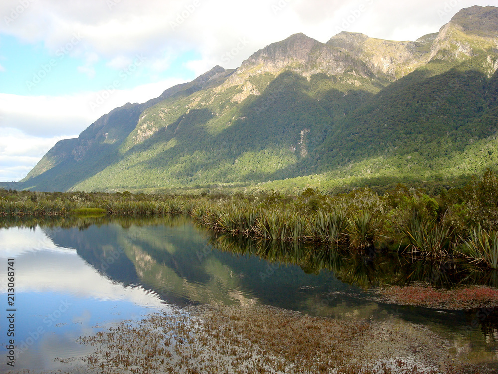 Mirror lake at Fiordland national park in South Island, New Zealand