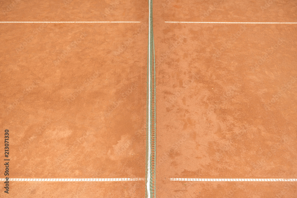 texture of brown tennis court with tennis net for game