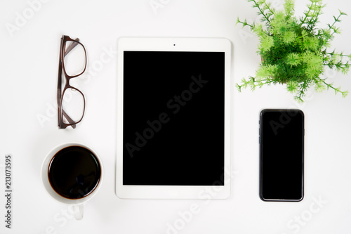 Office table with tablet,smartphone, copy space,Top view
