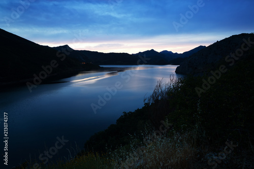 mountains reservoir in summer evening