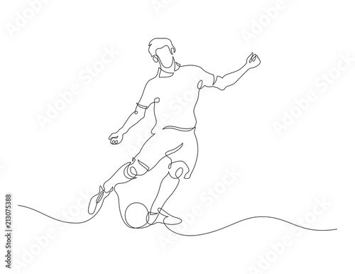 football (soccer) player silhouette with ball isolated