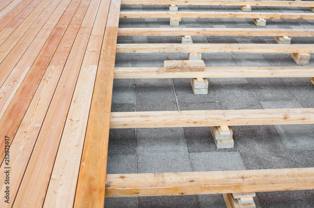 Construction of a wooden floor for a street cafe Construction of a wooden floor for a street cafe