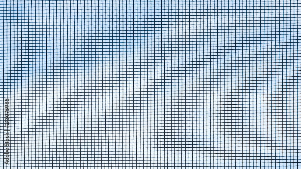 Mosquito net on the window. Protection against insects. Background. Mosquito net on the window. Protection against insects. Background.