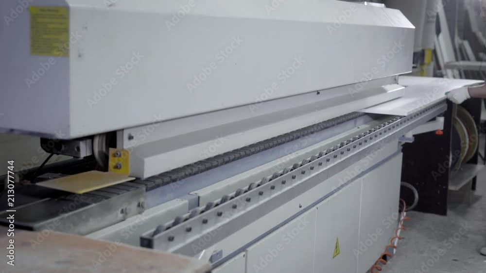 Big factory machine white standing and working in manufactory work room Big factory machine white standing and working in manufactory work room