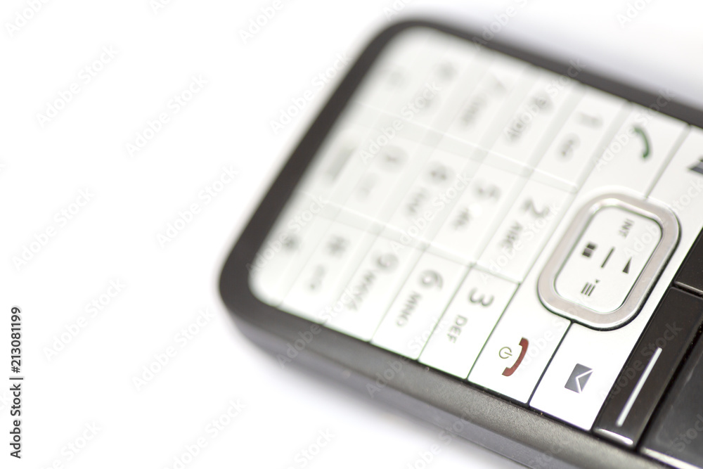 blurred cordless with symbol of e-mail and the keyboard blurred cordless with symbol of e-mail and the keyboard