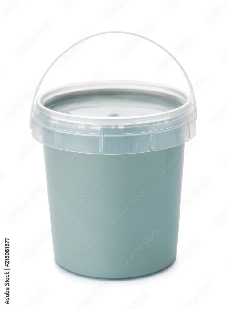 Plastic bucket full of cosmetic clay Plastic bucket full of cosmetic clay