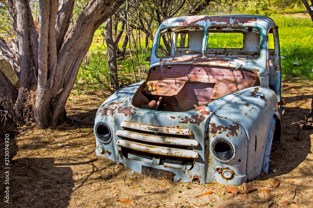 Wrecked and abandoned old blue truck Wrecked and abandoned old blue truck