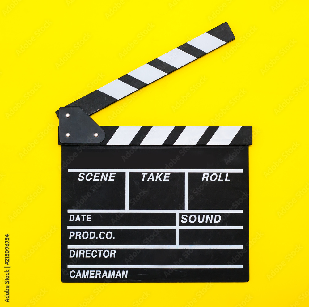  movie clapper on a yellow background