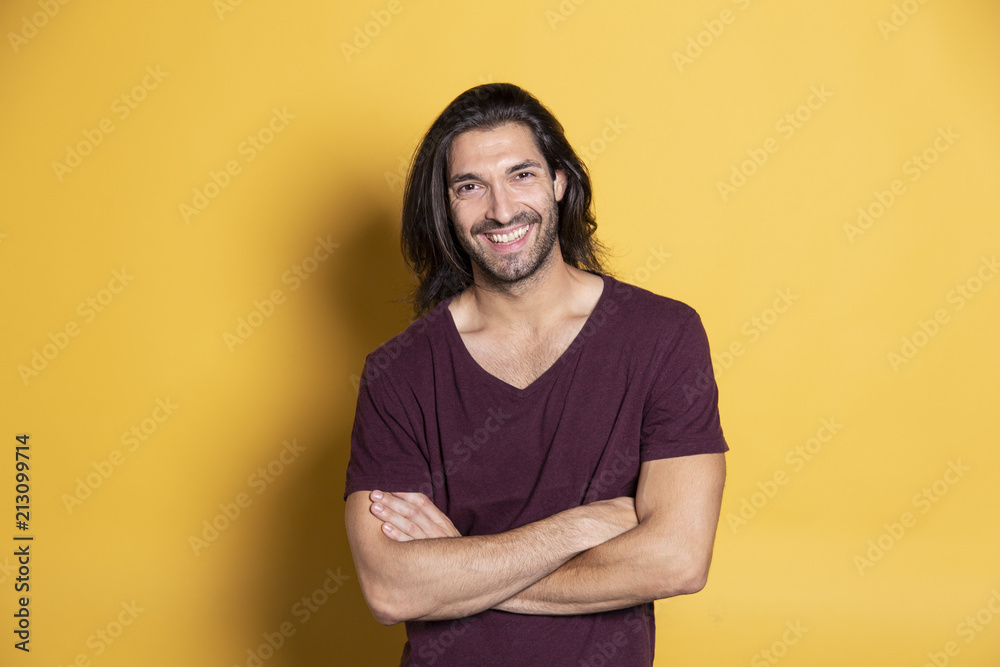 Handsome confident man smiling for camera