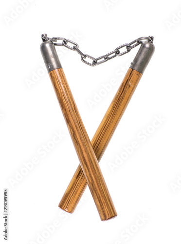 wooden nunchuck on white background photo