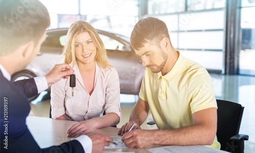 Couple with car dealer