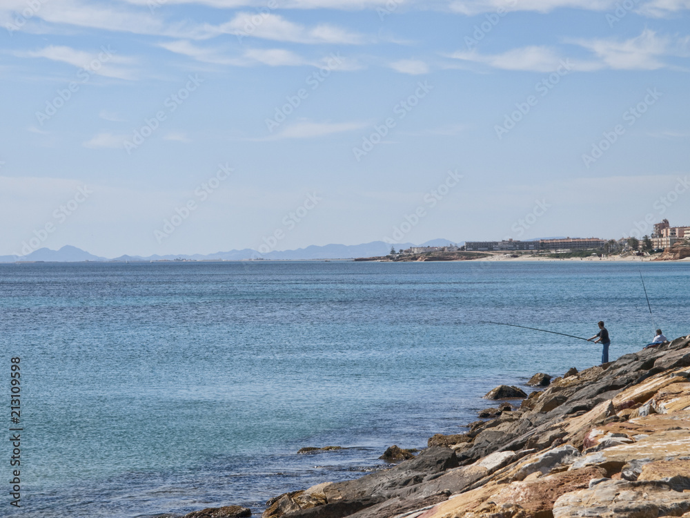 Fisherman at Port of Orihuela Alicante Spain Fisherman at Port of Orihuela Alicante Spain