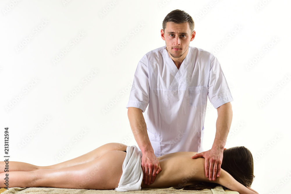 therapy. spa therapy for naked woman and man masseur isolated on white,  copy space. therapy massage in spa salon. sexy couple has massage therapy.  you are doing well. Stock Photo | Adobe