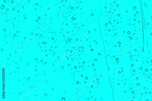 water drops on glass  texture  abstract background  summer rain  blue  menthol