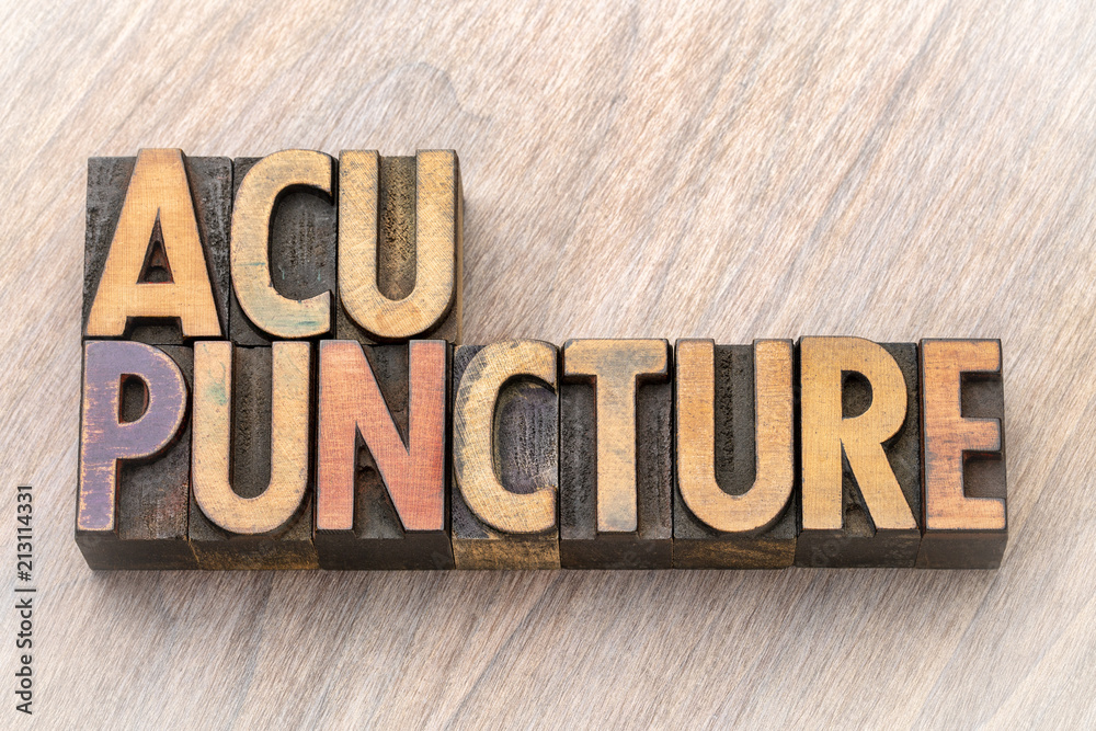Fototapeta premium acupuncture word abstract in wood type