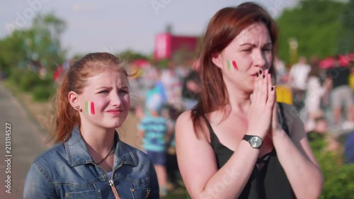 Girls are worrying while watching match photo