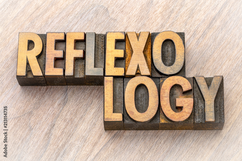 Fototapeta premium reflexology word abstract in wood type