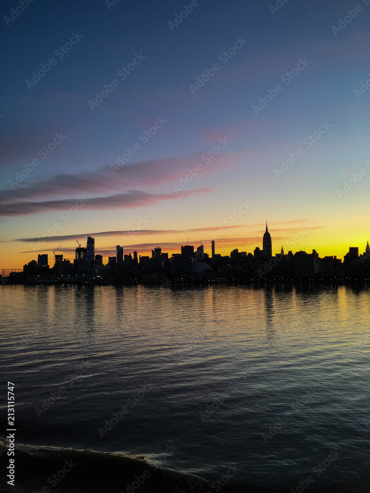Silhouette of the Manhattan skyline in New York at dawn Silhouette of the Manhattan skyline in New York at dawn