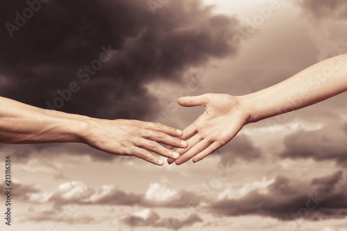 Hands of man and woman