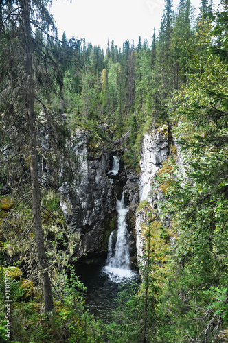 Virgin Komi forests, a waterfall in the rocks.