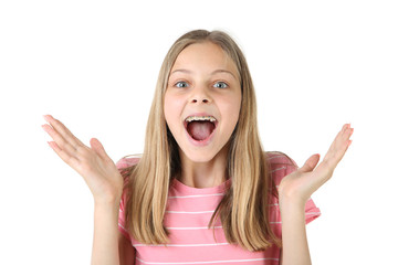 Young smiling girl with dental braces on white background
