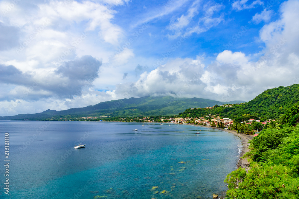 Paradise coast at Saint Pierre with Mt. Pelee, active volcanic mountain in Martinique, Caribbean Sea