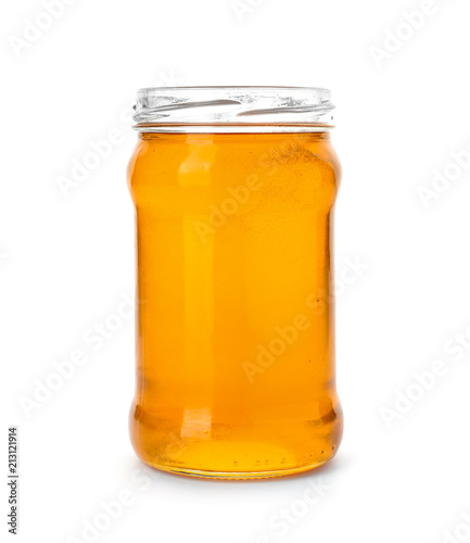 Jar with delicious honey on white background