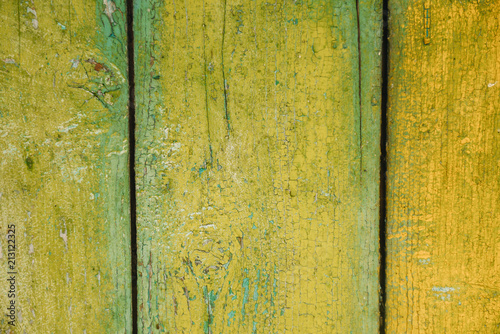 Wooden wall background or yellow and green textures