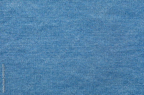 Texture of blue jeans as background