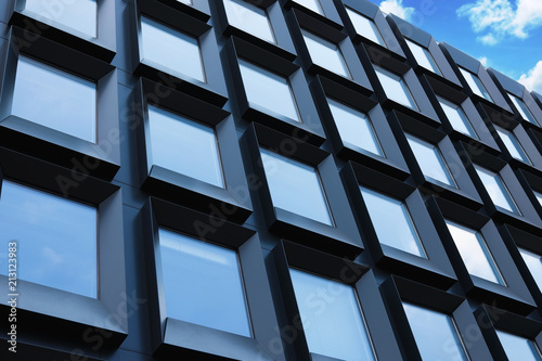 Building with tinted windows  outdoors. Modern architectural design