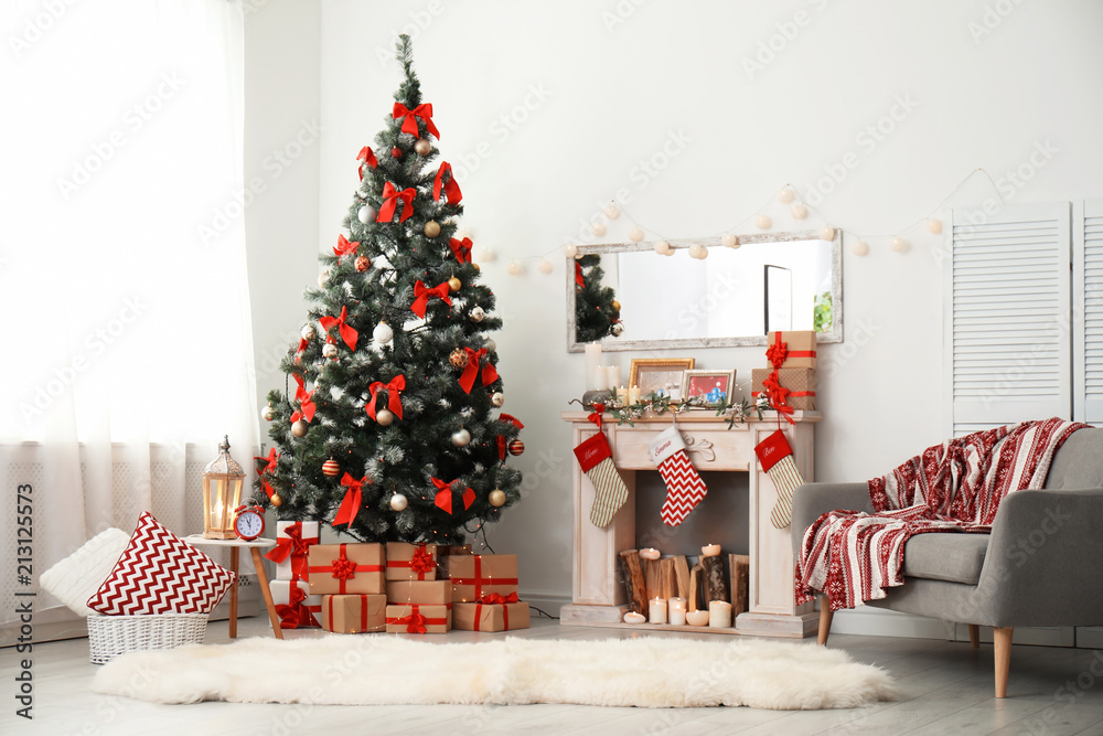 Stylish living room interior with decorated Christmas tree Stock Photo ...