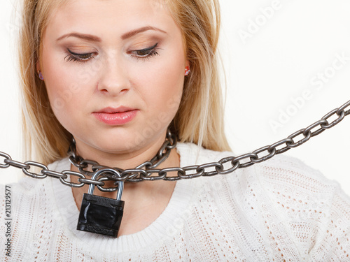 Woman having metal chain around neck photo