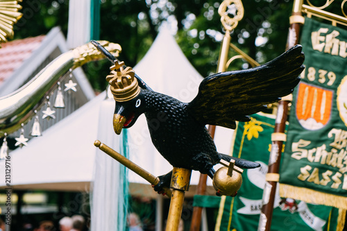 Banner and wooden eagle and other insignia of the mercenaries at the "Schützenfest" in Sassenberg, Germany